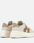 Dettaglio posteriore sneakers Hogan Rebel donna beige avorio con tallone in suede e suola alta